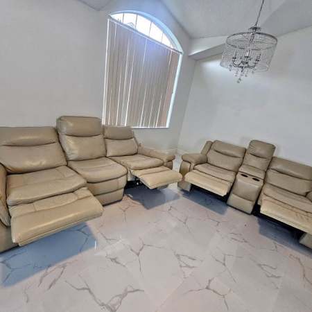 Beige Leather Recliner Set- Sofa and Loveseat